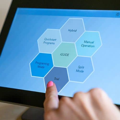 Close-up of iMRS Prime control panel touchscreen being used