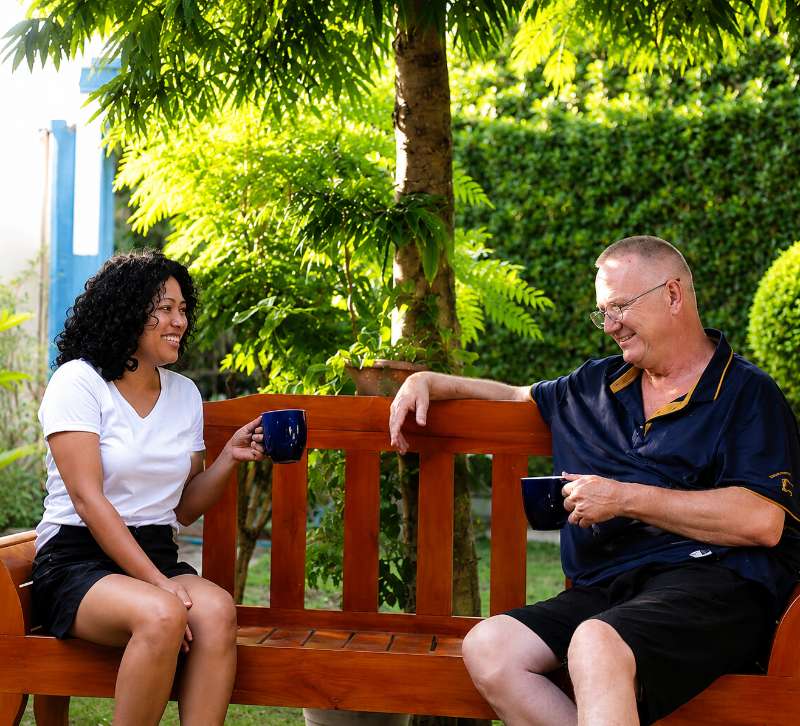 Andrew and Cherry Mae enjoying a relaxed conversation at Twelftree Wellness Centre near Dumaguete