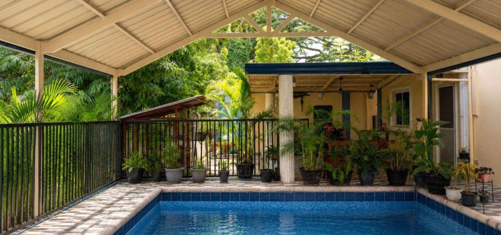 Covered pool and tropical relaxation area at Twelftree Wellness Centre near Dumaguete, Negros Oriental.